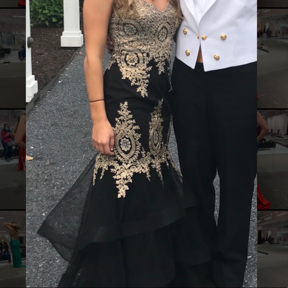 Classic black mermaid dress with gold detail